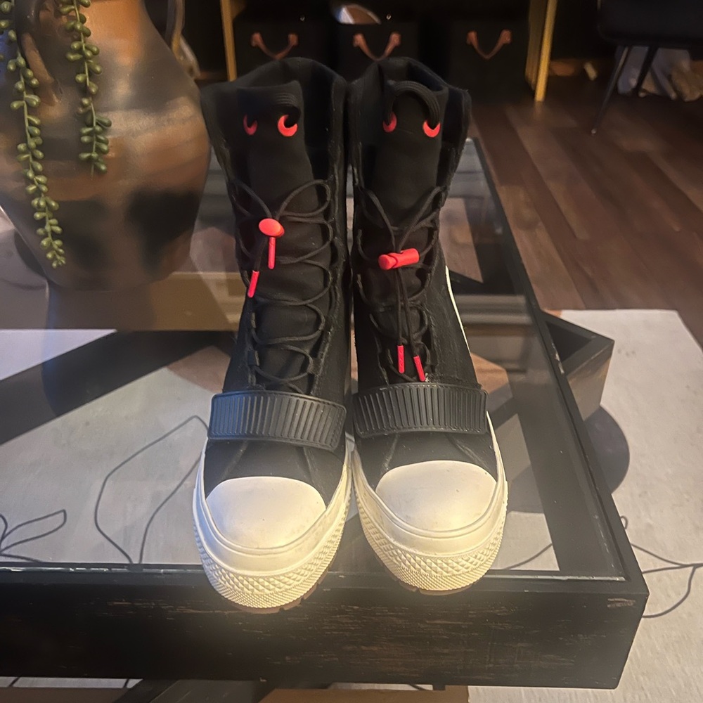 Black and White High-Top Sneakers with Red Accents